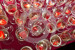 Champagne glasses filled with strawberries