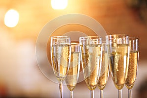 Champagne glasses on gold background. Party concept