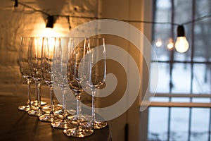 Champagne glasses on gold background. Party and holiday celebration concept
