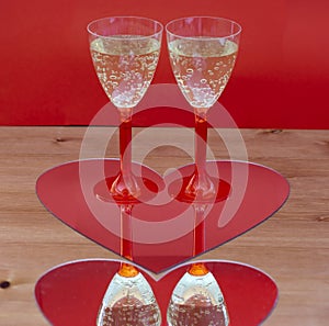 Champagne glasses in heart