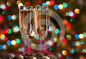 Champagne glasses on New Year`s Eve. Merry christmas and a happy new year