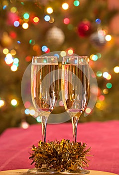 Champagne glasses on New Year's Eve. Merry christmas and a happy new year