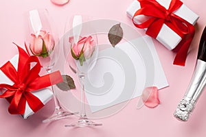Champagne glasses and rose flowers