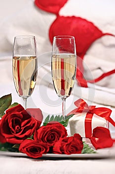 Champagne glasses and roses to celebrate Valentine's