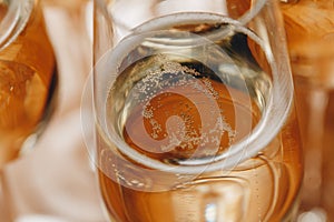 Champagne glasses on table closeup.