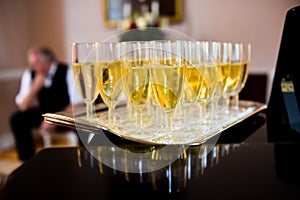 Champagne glasses on a tray