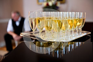 Champagne glasses on a tray