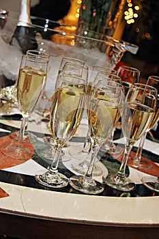 Champagne Glasses wait for Toast at Wedding Celebration