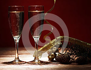 Champagne glasses on wooden table