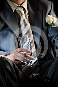 Champagne for groom in the limousine