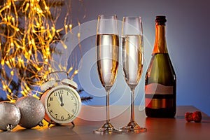 Champagne And New Year Decoration With Vintage Clock And Holiday Lights