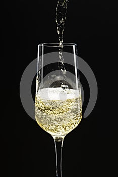 Champagne pouring into a glass