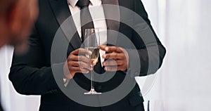 Champagne, speech and hands of person with glass to toast for special event, congratulations or New Year. Chat, classy