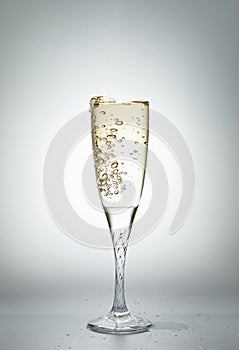 champagne splashing out of a glass