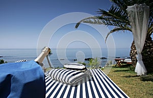 Champagne sunlounger and sunny sea views