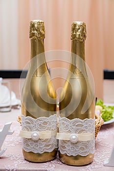 Champagne to the newlyweds on the table