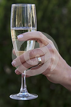 Champagne and wedding ring