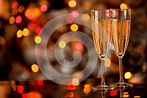 Champagner on Glass Table with Bokeh background