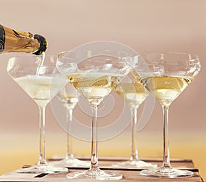 Champaign being pored into glasses