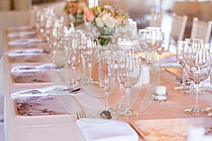 Champaigne and wine glasses on table at wedding reception