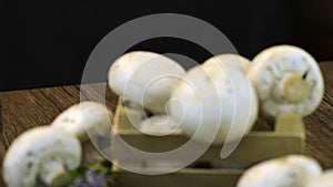 Champignons in a wooden box