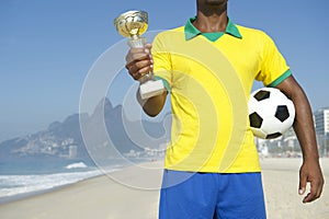 Champion Brazilian Soccer Player Holding Trophy and Football