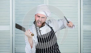 He is a champion in the kitchen. angry bearded man with knife. love food. cook in restaurant. chef ready for cooking