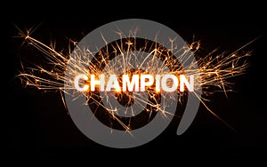 CHAMPION title word in glowing sparkler