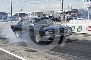 Plymouth barracuda smoke show on the track