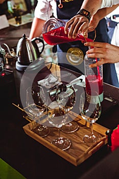 Championship among coffee houses, members of teams show barista`s skill, prepare drinks