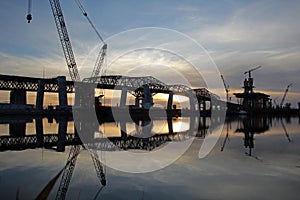 Bridge construction at sunset