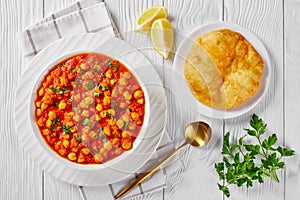 Chana masala or chickpea curry on a white plate