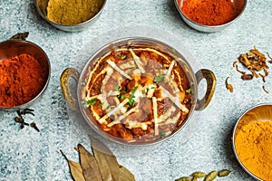 Chana Masala or chola gravy with chili sauce served in a dish isolated on grey background top view of bangladesh food