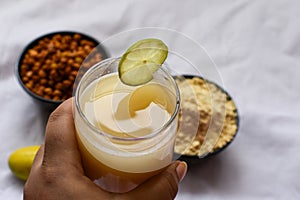 Chana sattu summer drink, prepared by dry roasting grains or grams, mainly barley, suger, salt , lemon and water. Selective focus