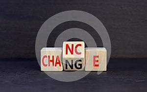 Chance and change symbol. Concept word Chance Change on wooden cubes. Beautiful black table black background. Business and chance