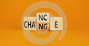 Chance and change symbol. Concept word Chance Change on wooden cubes. Beautiful orange table orange background. Business and