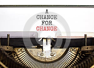 A chance for change symbol. Concept words A chance for change typed on beautiful old retro typewriter. Beautiful white background