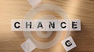 Chance word made from change on wooden cubes. Personal development motivation goal achievement, overcoming difficulties concept