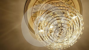 Chandelier on ceiling with glowing light