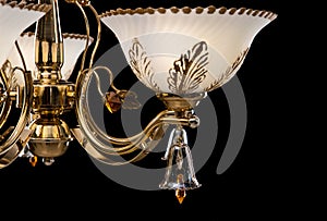 Chandelier classic isolated on black background. Chandelier closeup , luxury retro style on dark background.