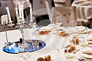 Chandelier on elegant dinner table