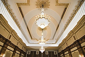 chandeliers on ornate ceiling photo