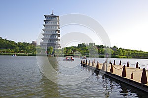 The chang `an tower in xi `an world expo park is the landmark of this tourist attraction.