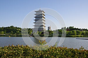 The chang `an tower in xi `an world expo park is the landmark of this tourist attraction.