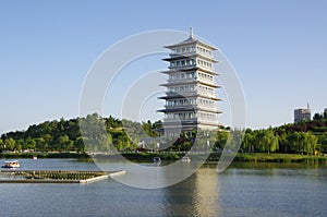 The chang `an tower in xi `an world expo park is the landmark of this tourist attraction.