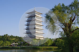 The chang `an tower in xi `an world expo park is the landmark of this tourist attraction.