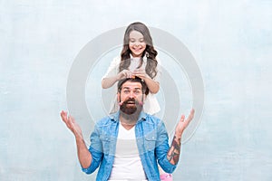 Change hairstyle. With healthy dose of openness any dad can excel at raising girl. Create funny hairstyle. Child making photo
