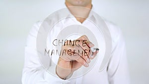 Change Management, Man Writing on Glass, Handwritten