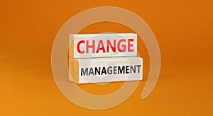 Change management symbol. Concept words Change management on beautiful wooden block. Beautiful orange table orange background.