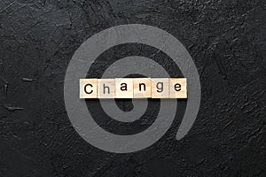 CHANGE word written on wood block. CHANGE text on cement table for your desing, concept